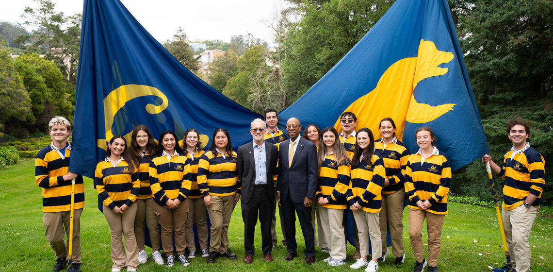 Picture of Chancellor Lyons and UC President Drake with Berkeley students